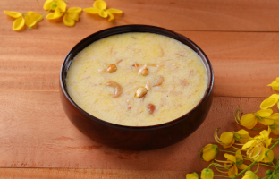 Receive Prasadam at Ambalapuzha Sree Krishna Temple